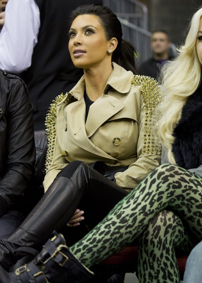 Kim Kardashian sits courtside during the NBA game between the New York Knicks and the New Jersey Nets