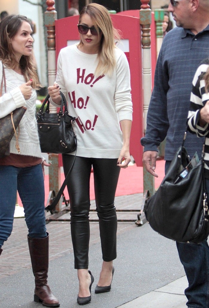 Lauren Conrad rocking her Lot78 Ho! Ho! Ho! knitted sweater with leather pants