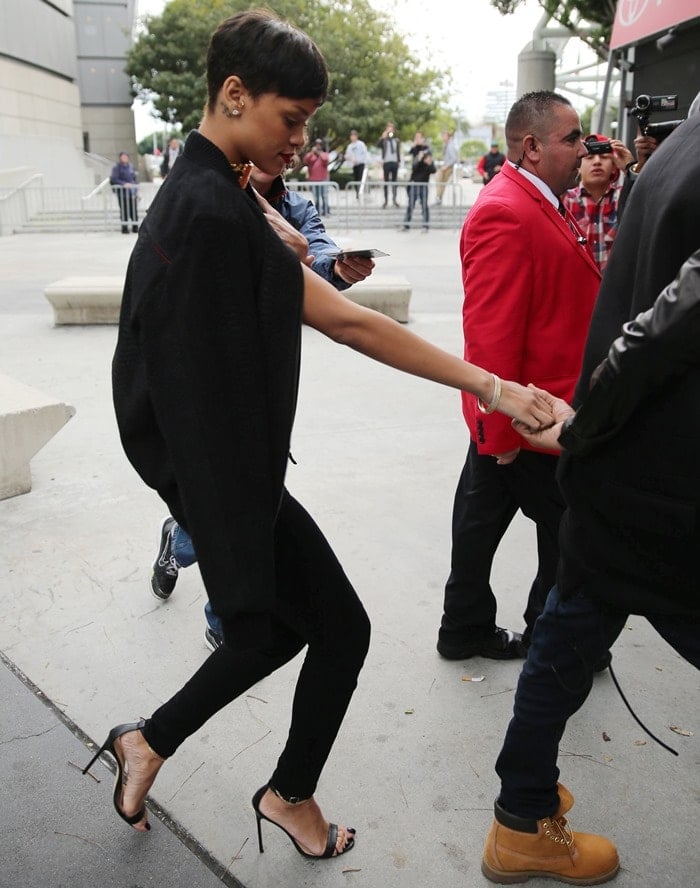 Rihanna shows off her feet in Manolo Blahnik Chaos sandals styled with Citizens of Humanity Avedon Slick skinny jeans