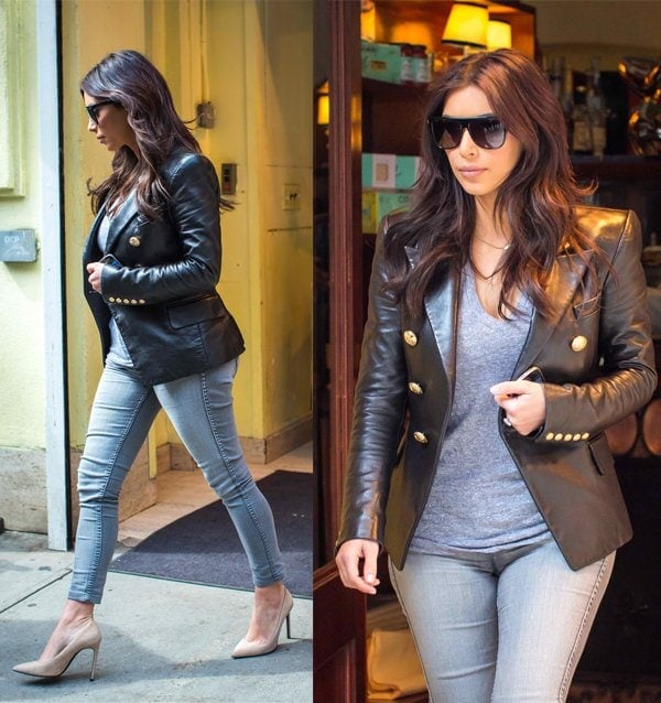 Kim Kardashian shows off her Balmain leather jacket while leaving Cipriani's restaurant