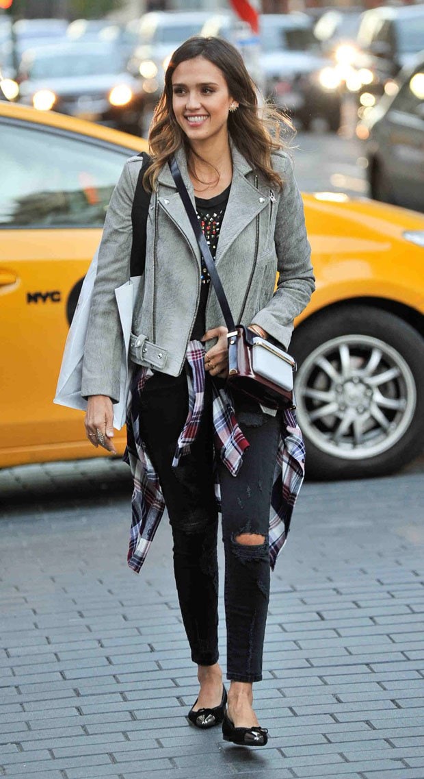 Jessica Alba wears a grey IRO Jova leather jacket with Current/Elliott The Stiletto Jeans in Black Shredded
