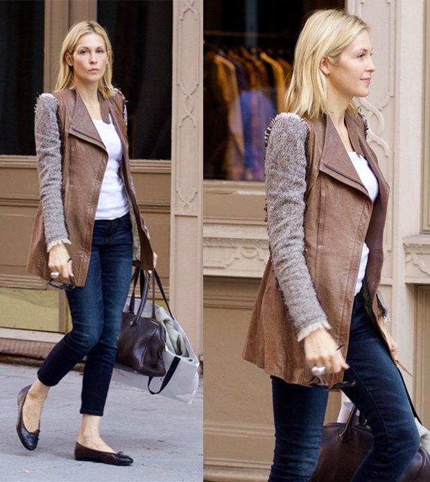 Kelly Rutherford wears a leather jacket with jeans