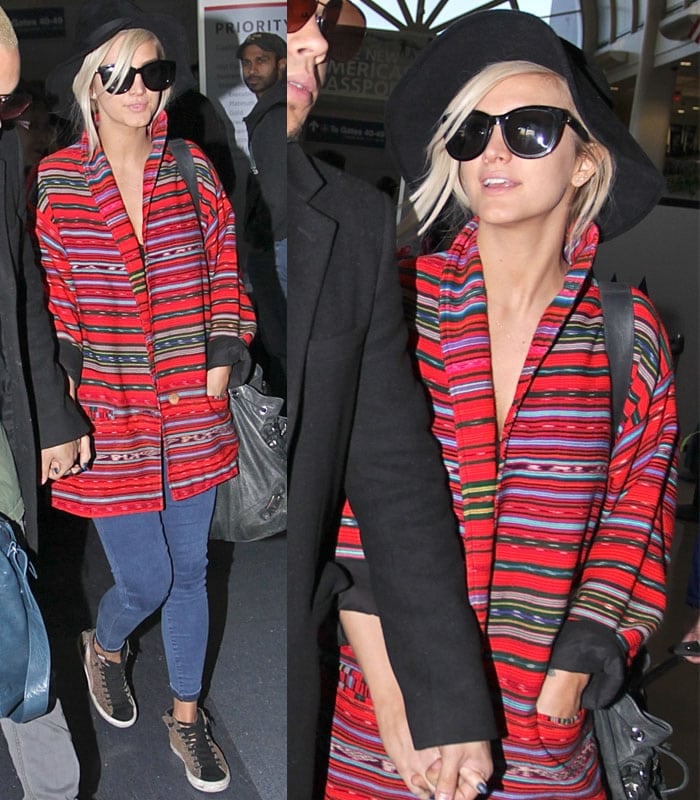 Ashlee Simpson hid her baby bump in a red striped coat