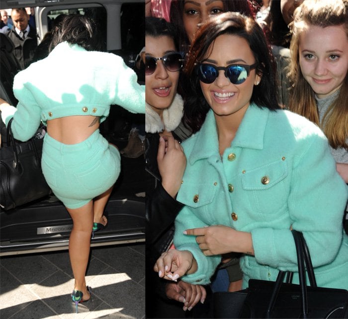 Demi Lovato wowed in a Moschino Pre-Fall 2015 twin set that she wore with a bustier top, a pair of Christian Louboutin Iriza pumps, and Woodys Barcelona Hiroto sunglasses