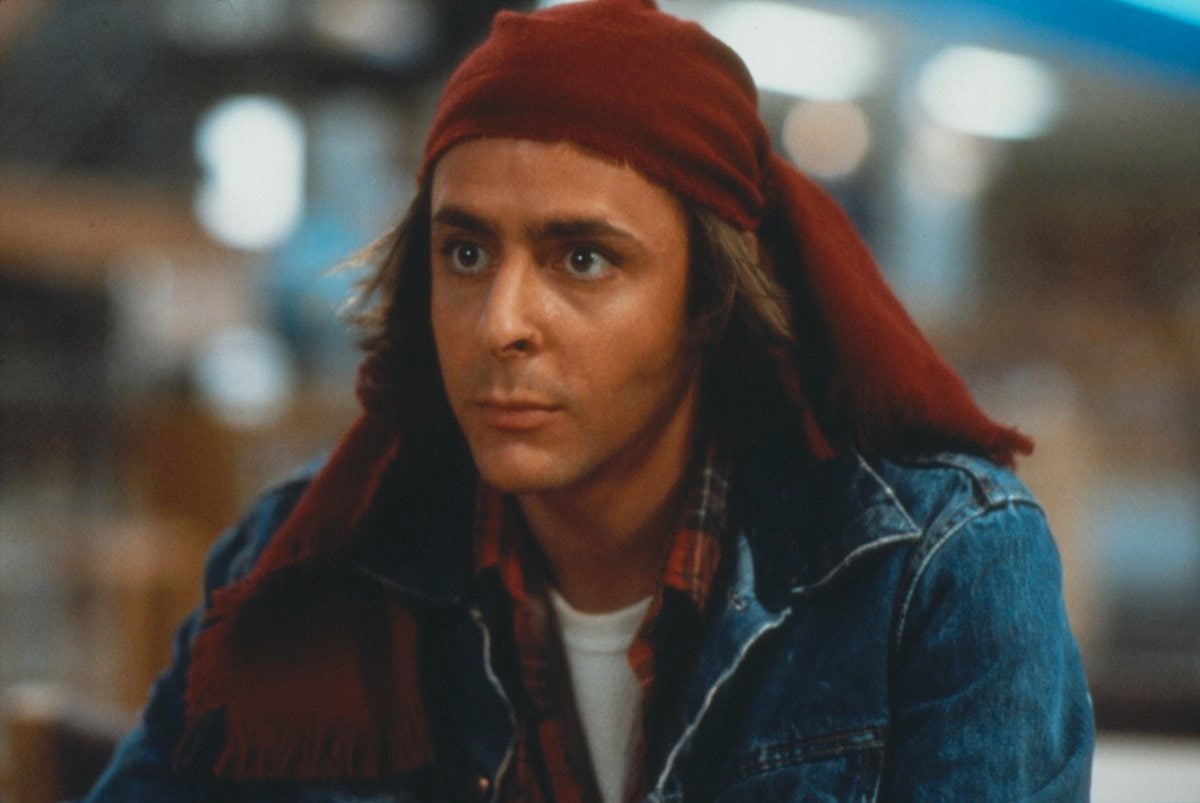Judd Nelson wears a denim jacket as John Bender in the 1985 American teen coming-of-age comedy-drama film The Breakfast Club