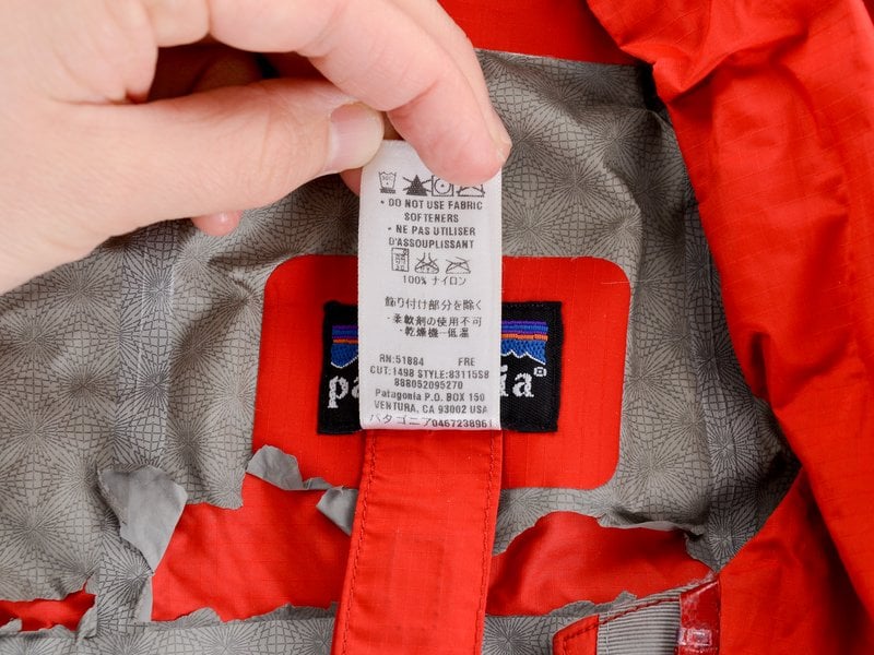 You should find the unique five-digital style code printed on the white tag inside the clothing